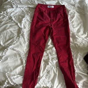 Red skinny “rockstar” jeans